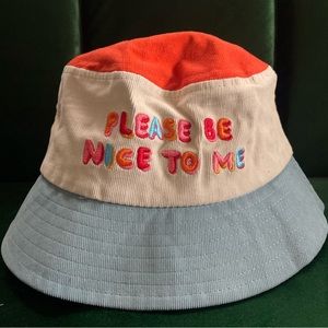 Bucket hat; “Please be nice to me”